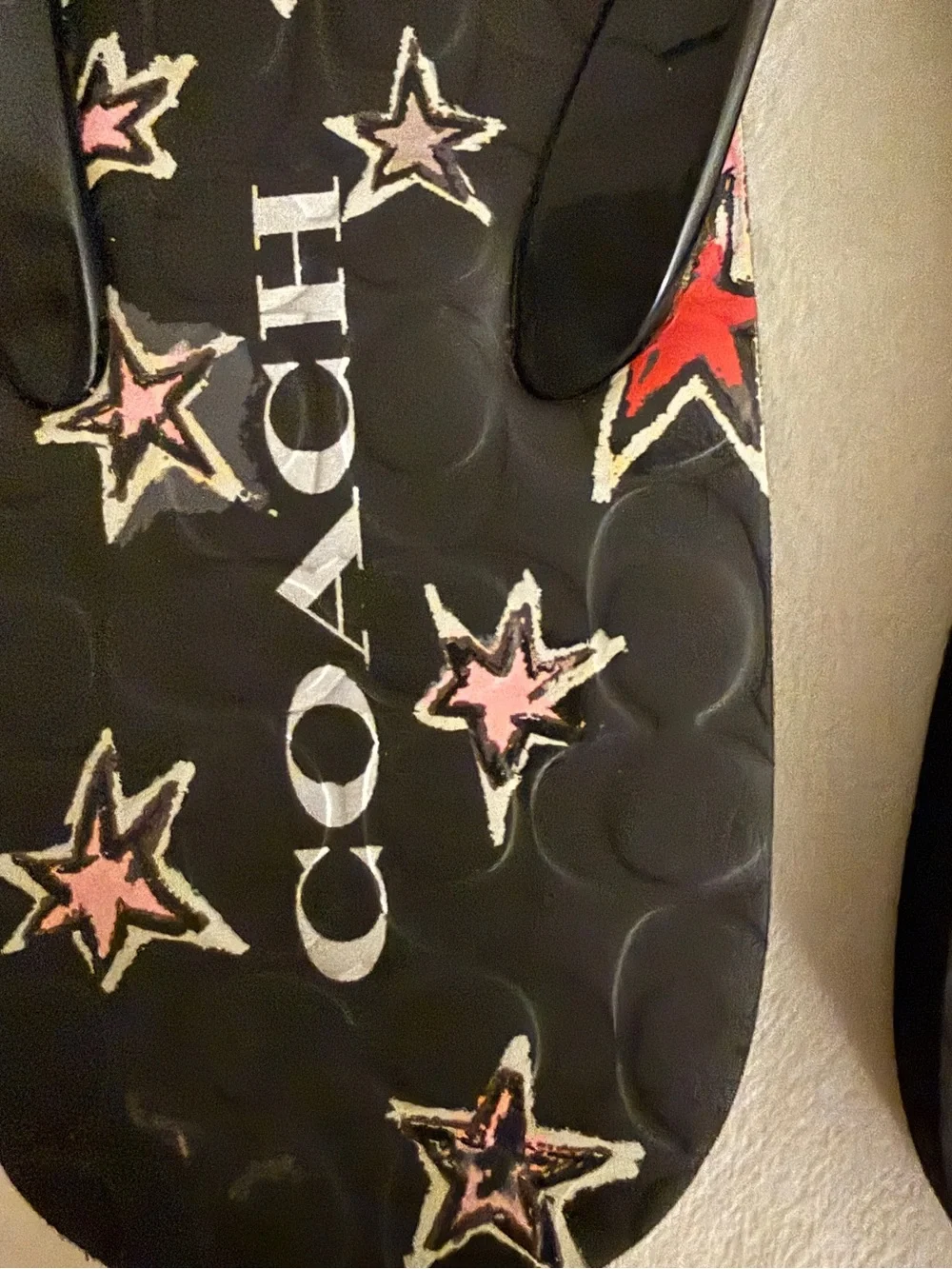 COACH Black Flip Flops with Pink & Red Star Print